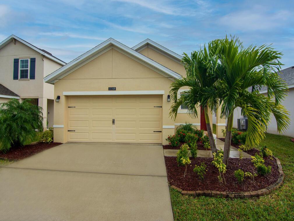 Photo of 11169 SW Sophronia Street, Port Saint Lucie, FL 34987 (MLS # R10763435)