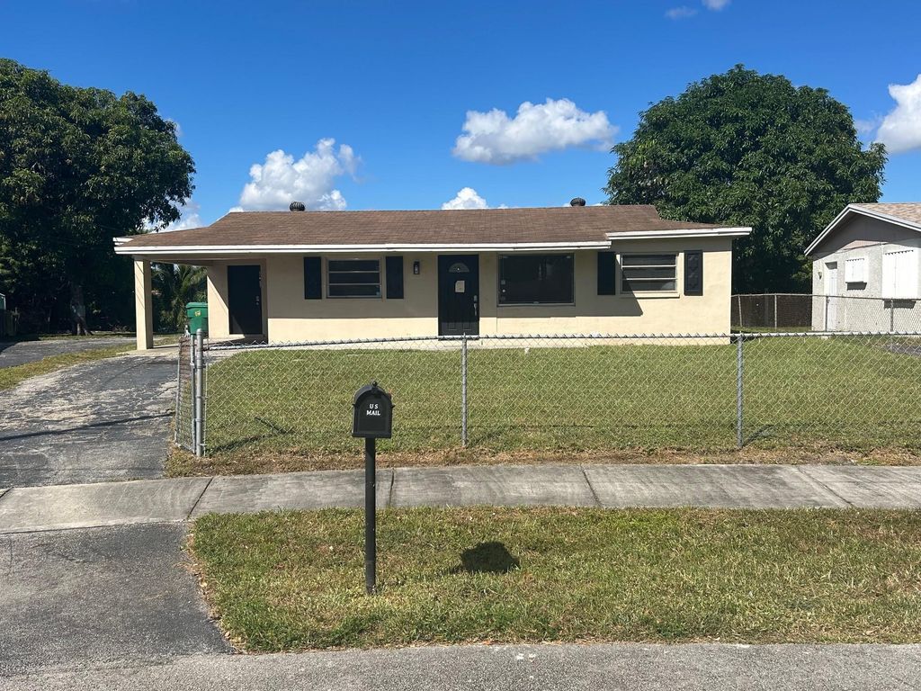 Photo of 3271 NW 17th St, Lauderhill, FL 33311 (MLS # F10533181)
