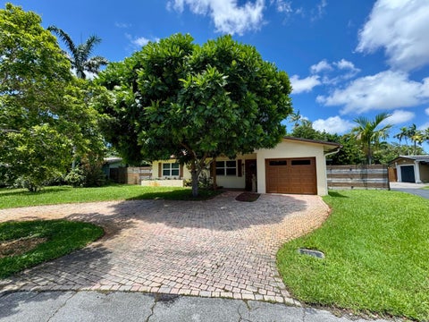 Photo of 1785 NW 39TH Place, Oakland Park, FL 33309 (MLS # B26062294)