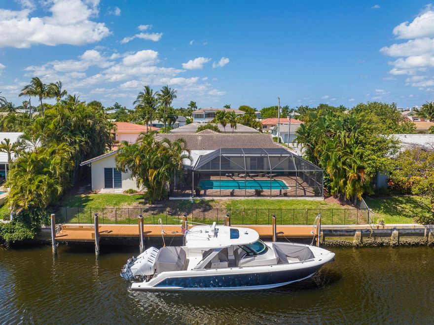 Welcome to 770 Dover Street, a one-level waterfront sanctuary offering the ultimate Boca Raton lifestyle! This stunning 3-bed, 2.5-bath home features gorgeous views from every room, a screened-in saltwater pool, large patio for entertaining, impact windows throughout, stainless steel appliances, wood flooring, and a private dock on the wide canal, seconds from the intracoastal.  Call today to schedule your exclusive tour.