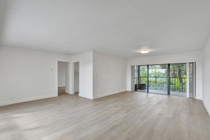 Beautifully updated open-concept, condo in the heart of Delray Beach. Minutes from Atlantic Avenue. This split bedroom condo has been completely renovated with the highest quality materials including new flooring, vanities, baths, shower, tile, new kitchen countertops and appliances, and a fabulous view! This 2nd floor unit offers screened in patio and plenty of space. The oversized bedrooms each have their own bathroom. The community offers a private pool, and ample parking. Pet friendly building. Call today for a private tour today, before this rare find is gone!