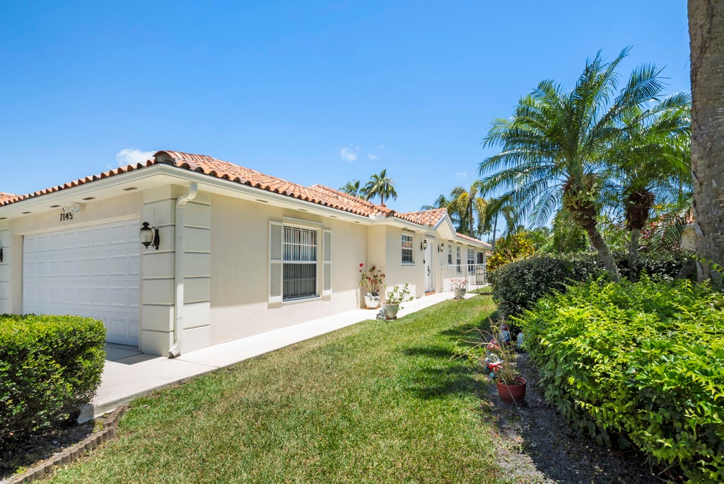 Photo of 7145 Grassy Bay Drive, West Palm Beach, FL 33411 (MLS # R10980548)