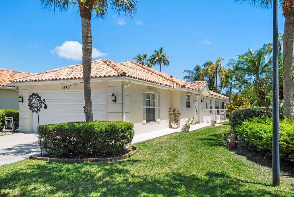 Photo of 7145 Grassy Bay Drive, West Palm Beach, FL 33411 (MLS # R10980548)