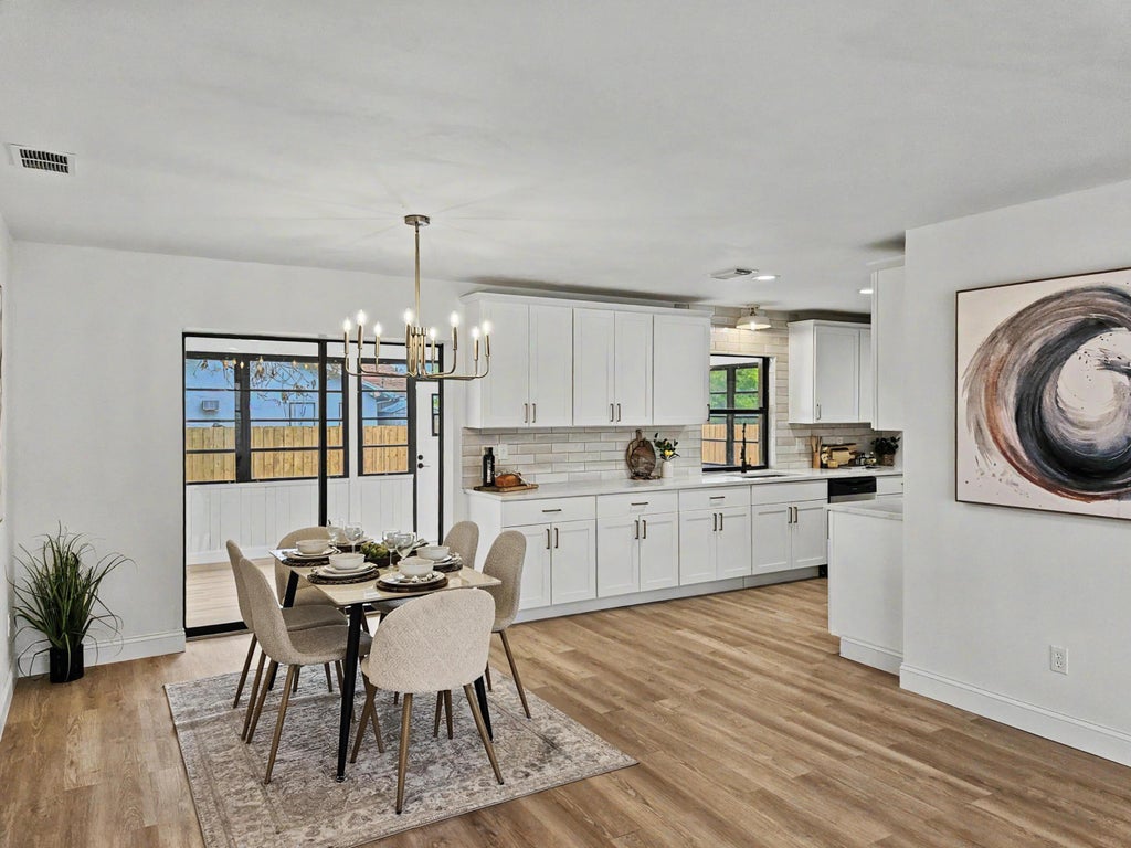 Photo of 1962 SW Libra Lane, Port Saint Lucie, FL 34984 (MLS # B26041536)