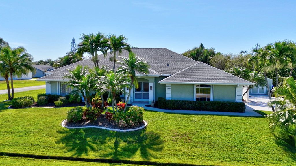 Photo of 2434 SE Hallahan Street, Port Saint Lucie, FL 34952 (MLS # R10978118)