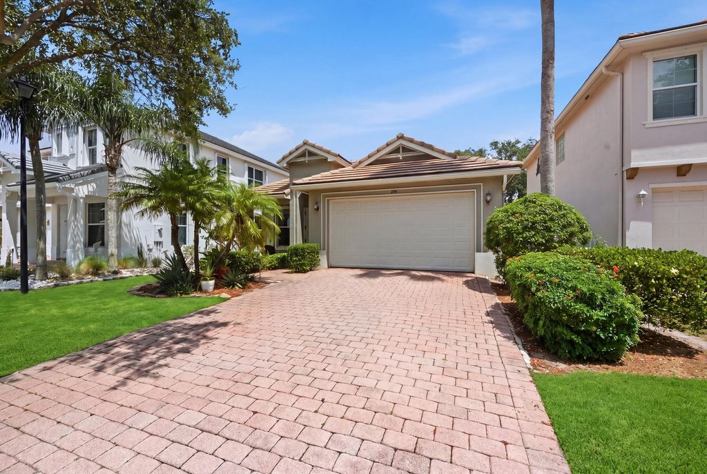 Photo of 283 Mulberry Grove Road, West Palm Beach, FL 33411 (MLS # B26021567)