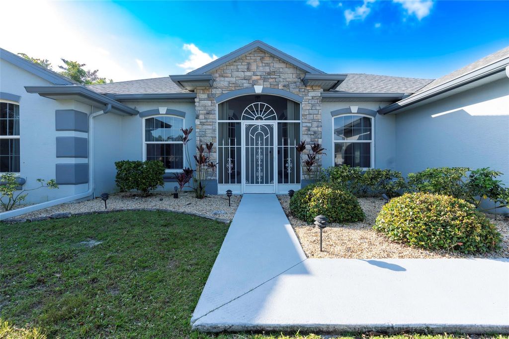 Photo of 1580 SW Santander Avenue, Port Saint Lucie, FL 34953 (MLS # F10434042)
