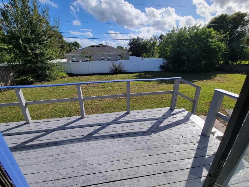 Photo of 1298 SW Parma Avenue, Port Saint Lucie, FL 34953 (MLS # R10930354)