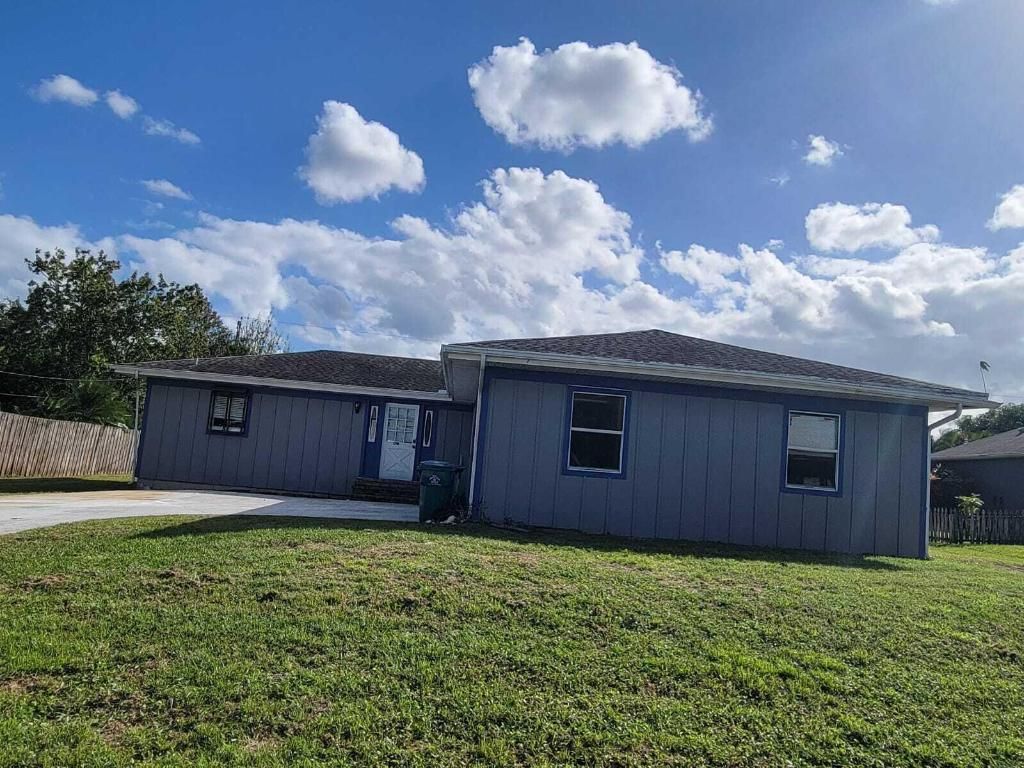 Photo of 1298 SW Parma Avenue, Port Saint Lucie, FL 34953 (MLS # R10930354)