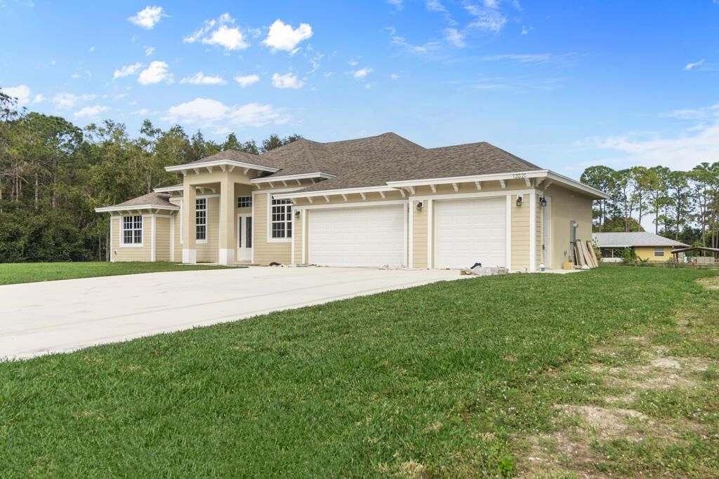 Photo of 12821 85th Road N, West Palm Beach, FL 33412 (MLS # R10952471)