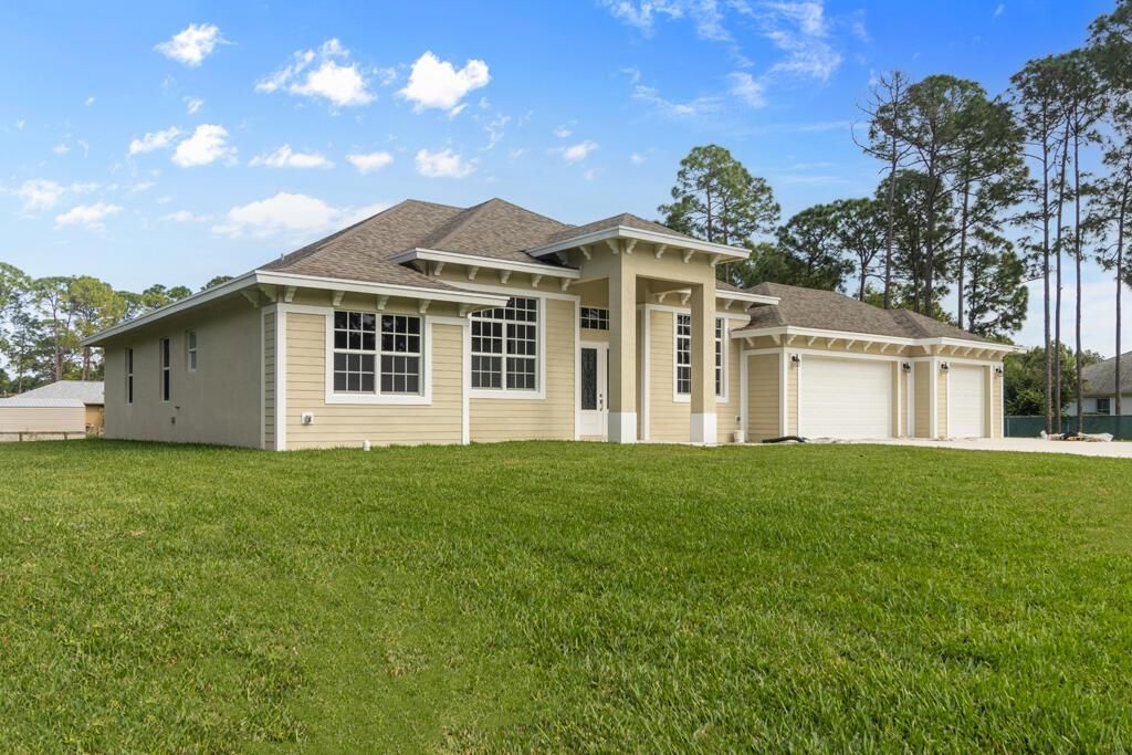 Photo of 12821 85th Road N, West Palm Beach, FL 33412 (MLS # R10952471)