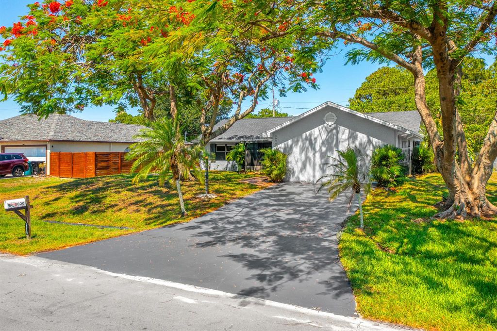 Photo of 3020 SW Briggs Street, Port Saint Lucie, FL 34953 (MLS # R10992922)