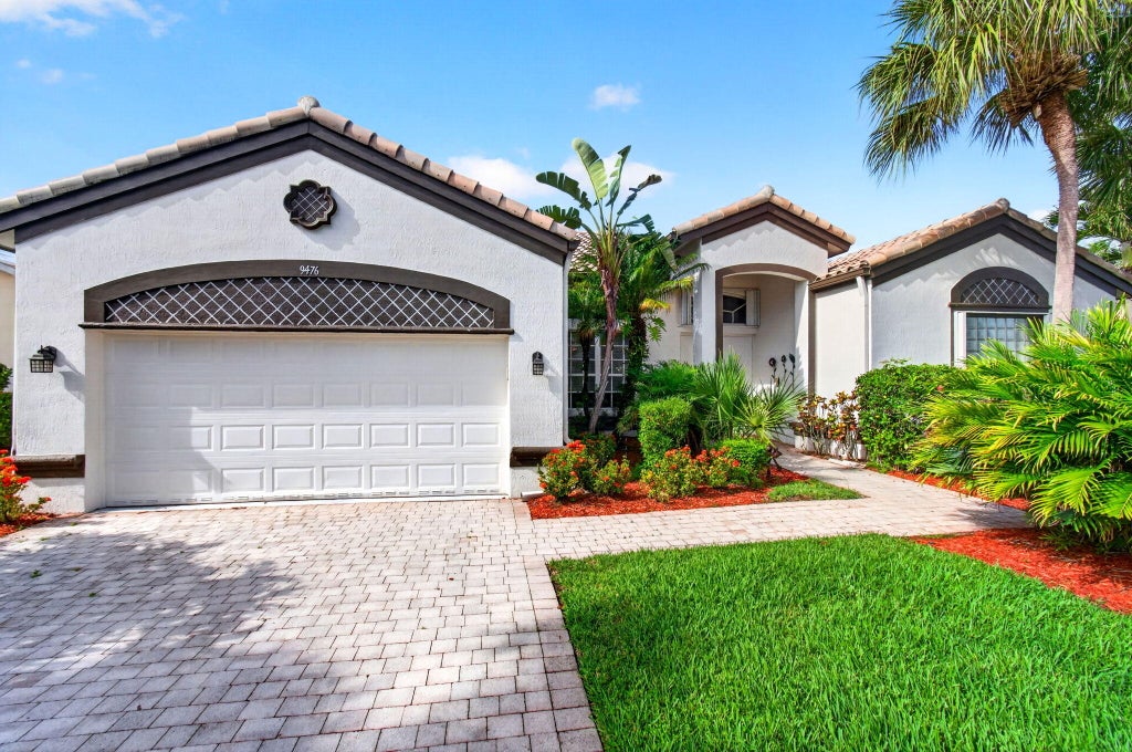 Photo of 9476 CASERTA Street, Lake Worth, FL 33467 (MLS # B26052014)