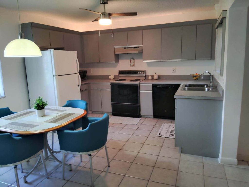 Photo of 2430 NW 12th Street, Delray Beach, FL 33445 (MLS # R11053917)