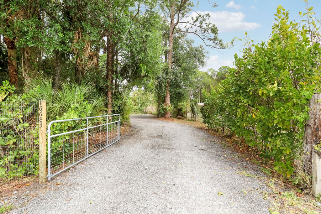 Photo of 16683 N 64th Pl Place N, Loxahatchee, FL 33470 (MLS # B26010057)