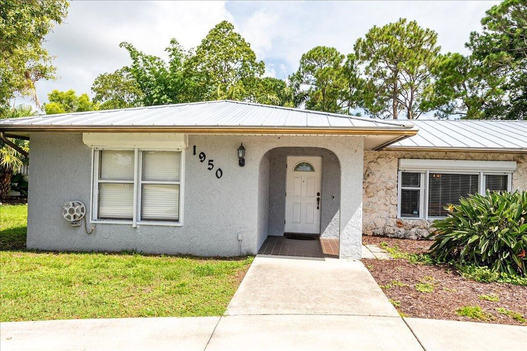 Photo of 1950 SE Crowberry Drive, Port Saint Lucie, FL 34983 (MLS # R11110774)