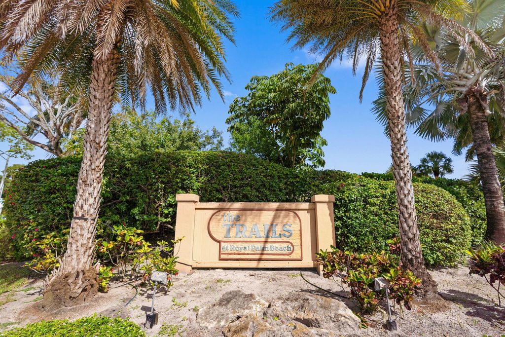 Photo of 402 Lakeview Drive E, Royal Palm Beach, FL 33411 (MLS # B26014851)