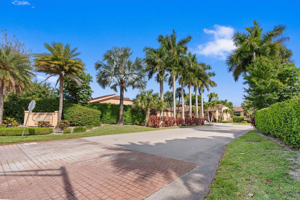 Photo of 402 Lakeview Drive E, Royal Palm Beach, FL 33411 (MLS # B26014851)