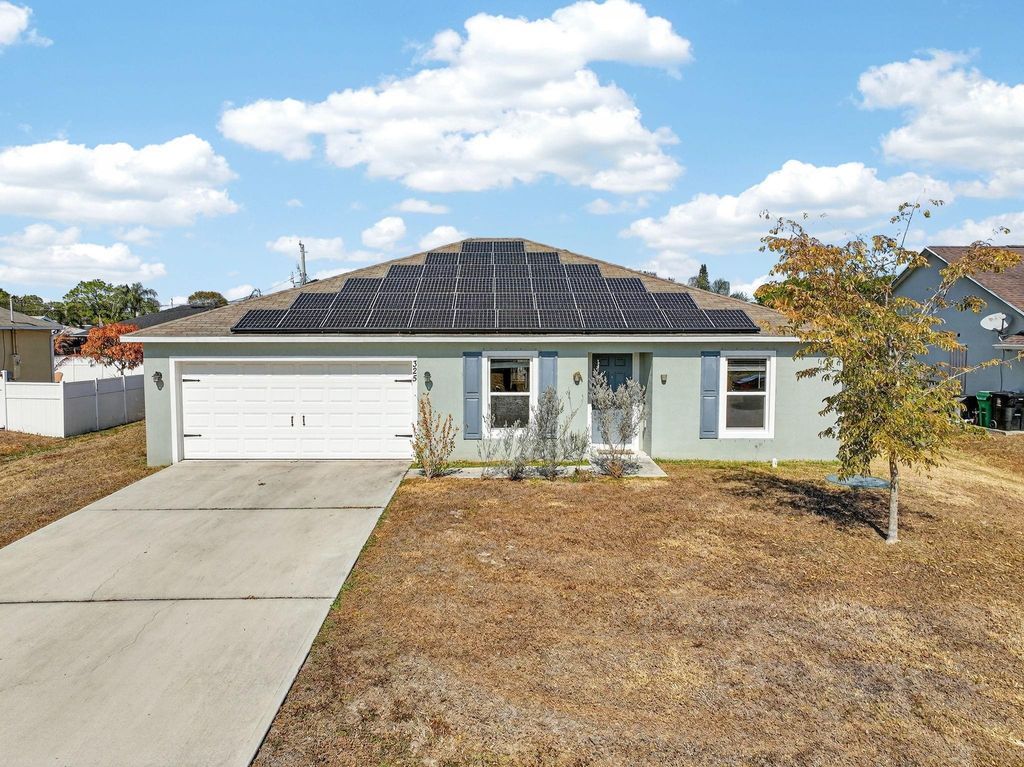 Photo of 325 SW Ray Avenue, Port Saint Lucie, FL 34983 (MLS # F10551597)