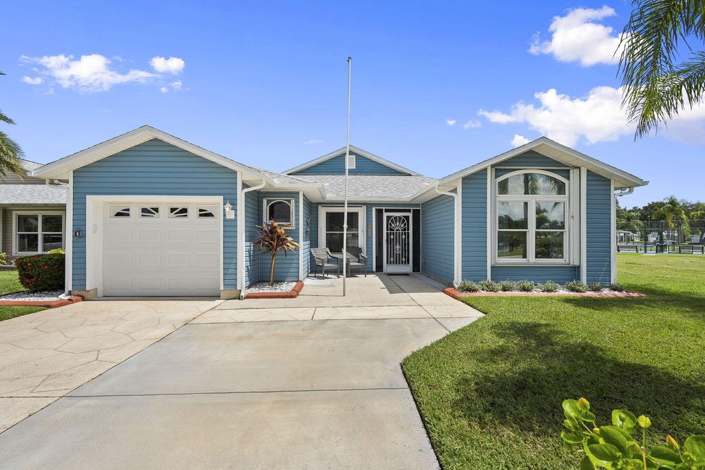 Photo of 556 Paurotis Lane, Fort Pierce, FL 34982 (MLS # R11121821)