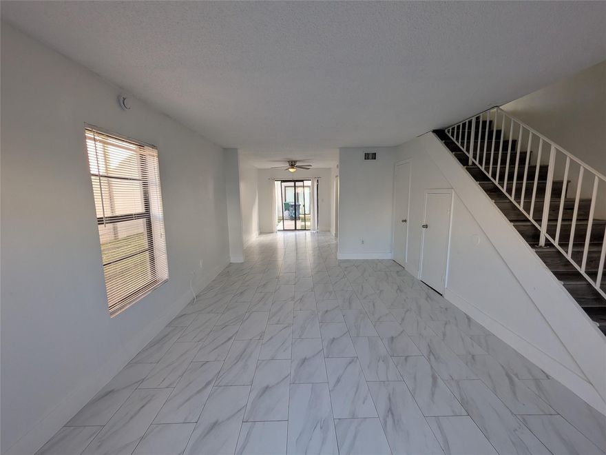 All ages community. Kitchen: wood cabinets, quartz countertop, stainless steel microwave, washer, and dryer inside the unit. Beautiful first-floor tile and vinyl floor on the second story! Association requires a minimum 625 credit score and immediate renting is OK. Roof replaced in 2022