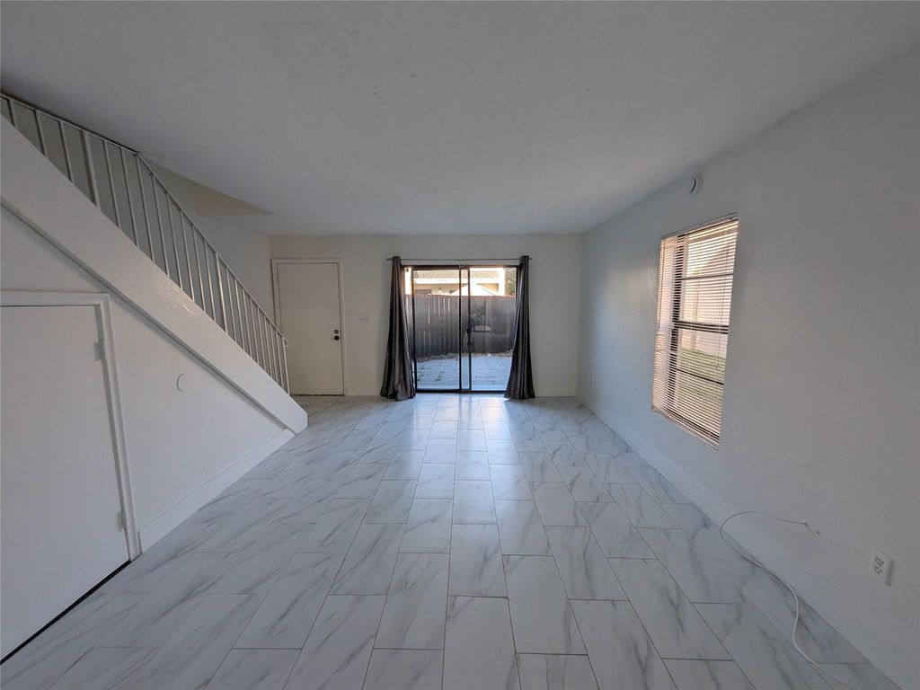 Photo of 2456 NW 52nd Ave #2456, Fort Lauderdale, FL 33313 (MLS # F10540592)