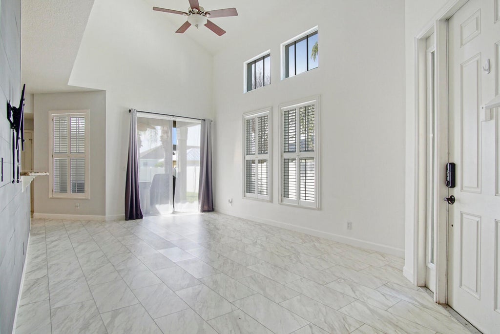 Photo of 10627 SW Cam Run, Port Saint Lucie, FL 34987 (MLS # R10966103)