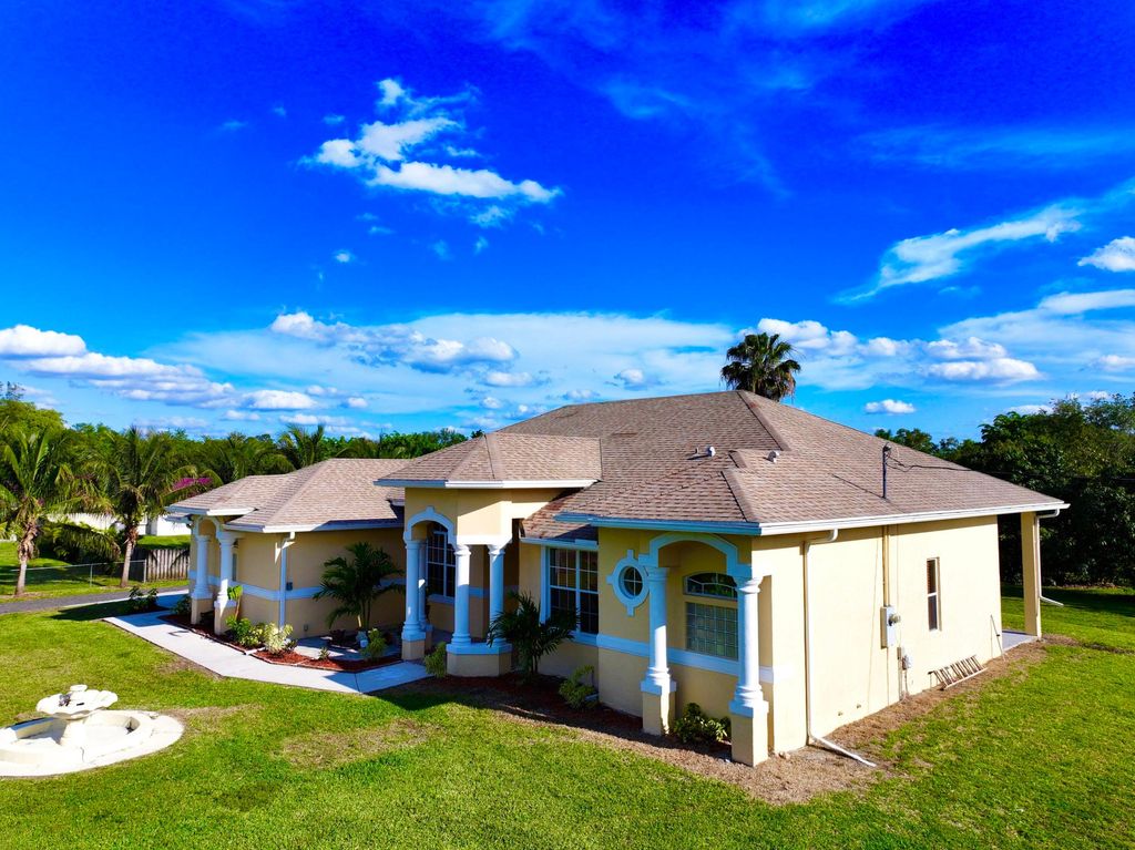 Photo of 17466 38th Lane N, The Acreage, FL 33470 (MLS # R10978720)