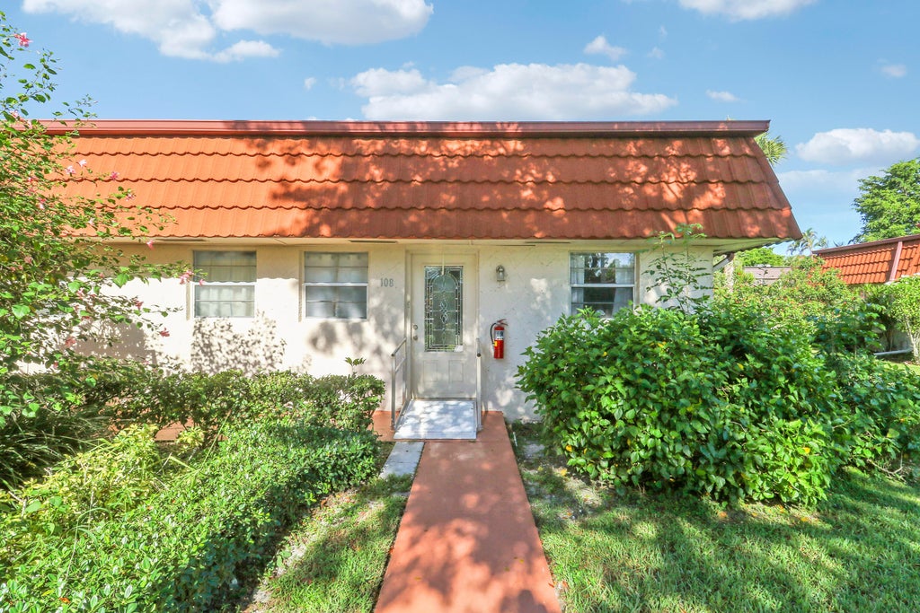 Photo of 12008 POINCIANA Boulevard #108, Royal Palm Beach, FL 33411 (MLS # B26071730)