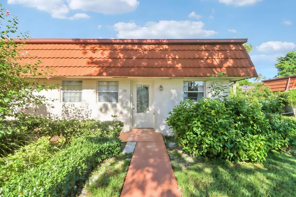 Photo of 12008 POINCIANA Boulevard #108, Royal Palm Beach, FL 33411 (MLS # B26071730)