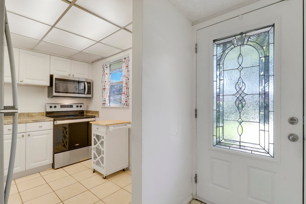 Photo of 12008 POINCIANA Boulevard #108, Royal Palm Beach, FL 33411 (MLS # B26071730)