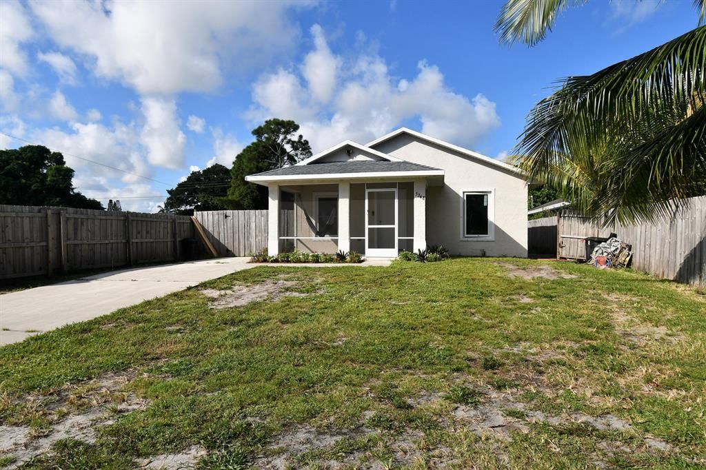 Photo of 5348 SE Driftwood Avenue, Stuart, FL 34997 (MLS # R10754029)