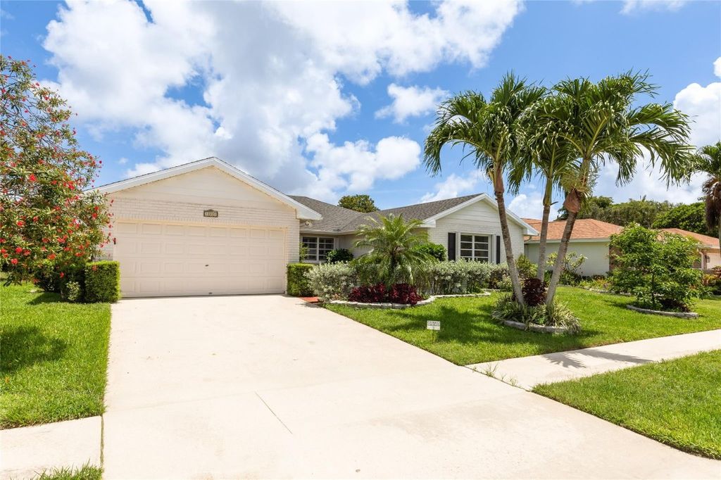 Photo of 10821 Greentrail Drive, Boynton Beach, FL 33436 (MLS # F10508799)
