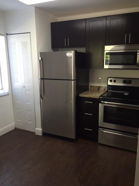 PARADISE COVE AT PALM BEACH LAKES CONDO - Residential