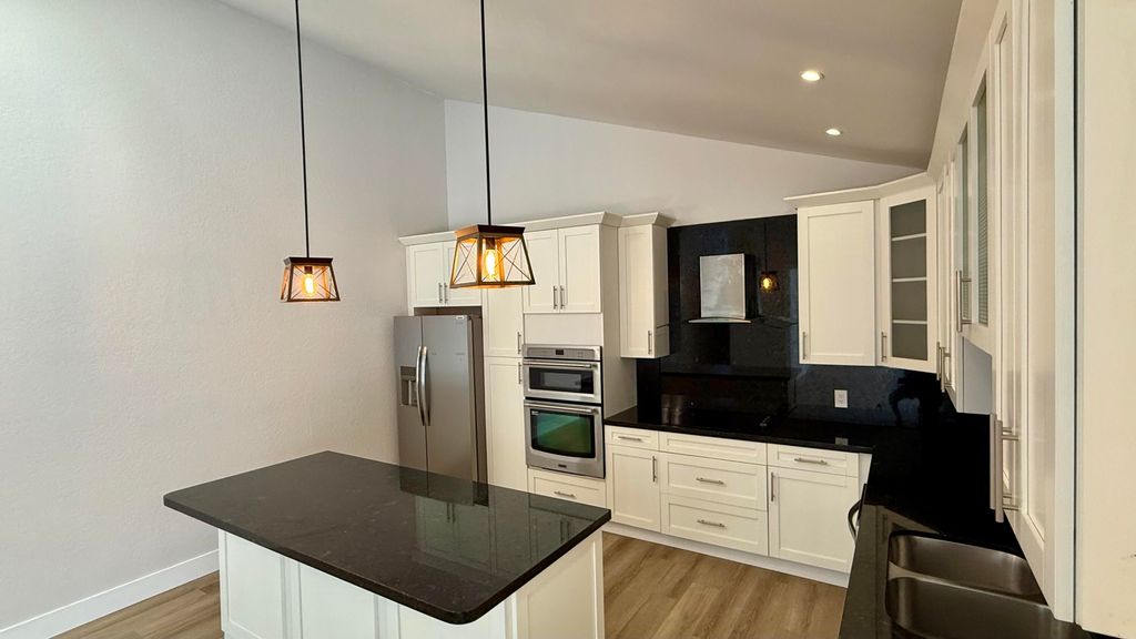 Photo of 5138 Woodruff Lane, Palm Beach Gardens, FL 33418 (MLS # B26004503)