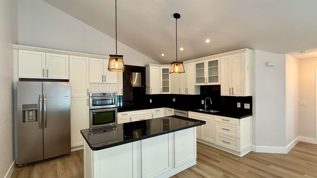 Photo of 5138 Woodruff Lane, Palm Beach Gardens, FL 33418 (MLS # B26004503)