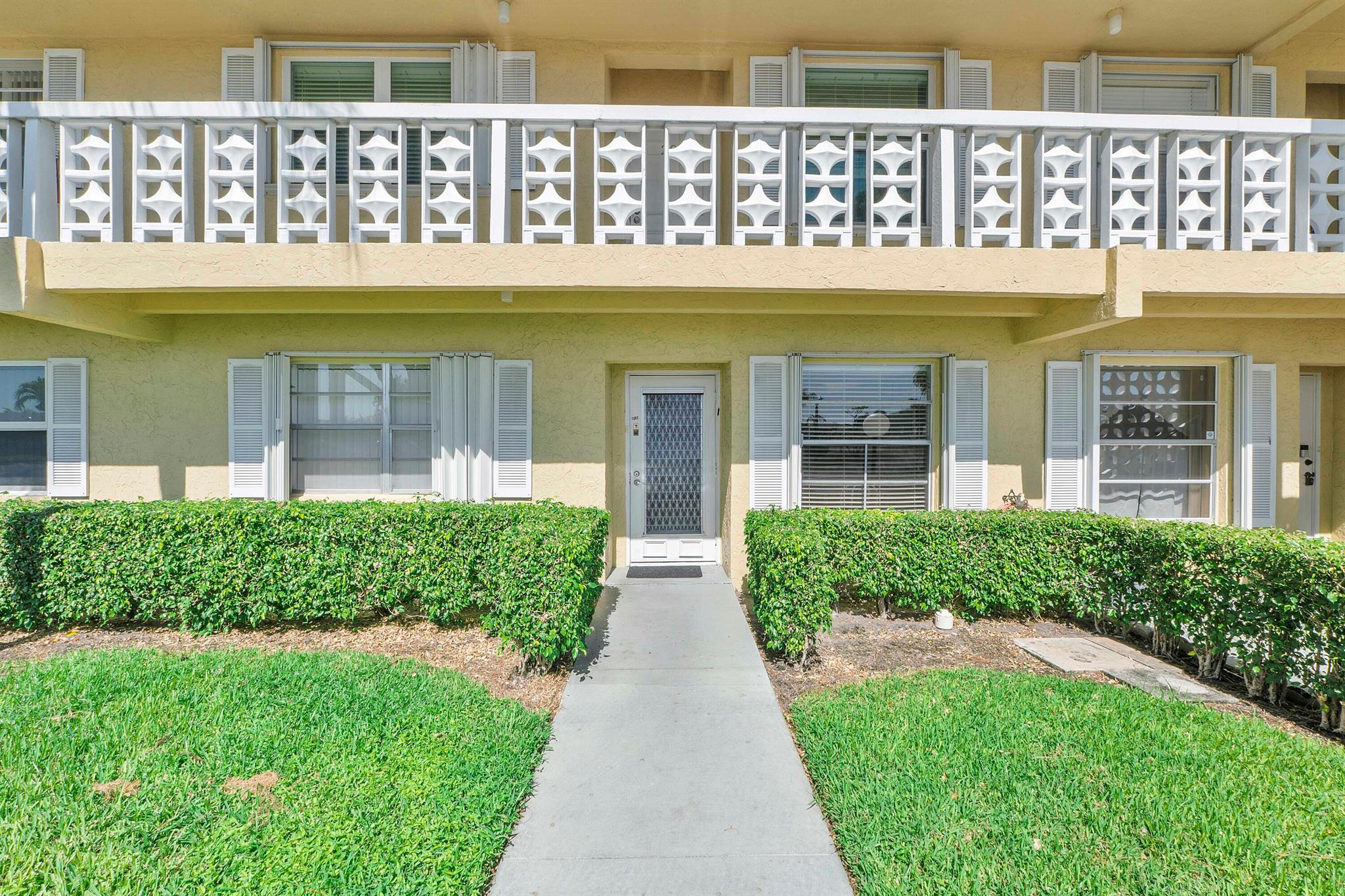 This is a sunny light first floor apt with a tiled floor porch off living room. Large white tile floors thoughout. New electric panel. AC is approx 8 yrs old. Appliances in fine working order. Kitchen is clean but original condition and will need to be updated. Eastern sunrises from kitchen and western sunsets from living room and porch.Adult community is active and has 2 pools,2 clubhouses.2 saunas,tennis,hot tub,pickleball,shuffleboard..many clubs and activities..New roofs on all buildings in 2025..Reserves. .2 Miles from the beaches and 5 minutes drive to bustling Atlantic Ave wth many boutiques and restaurants. 5 food markets within 1 mile..also close to Home Depot, Home Goods etc.