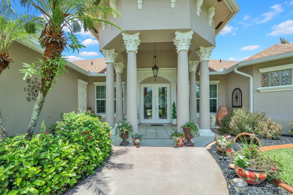 Photo of 2043 SE Bisbee Street, Port Saint Lucie, FL 34952 (MLS # B26042859)