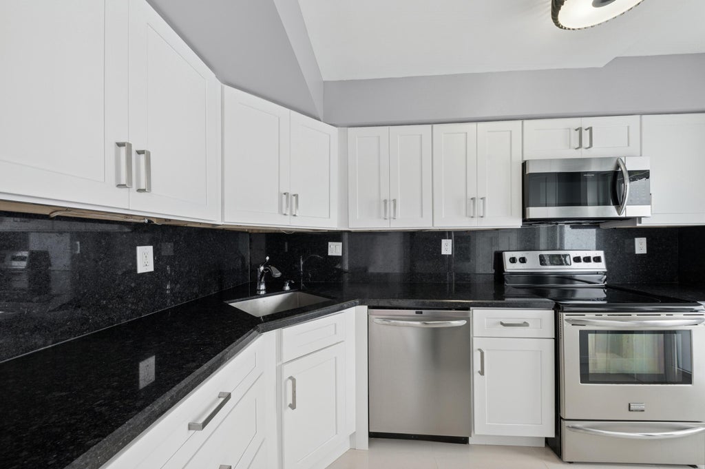 Photo of 333 NE 21ST Avenue #520, Deerfield Beach, FL 33441 (MLS # B26072229)