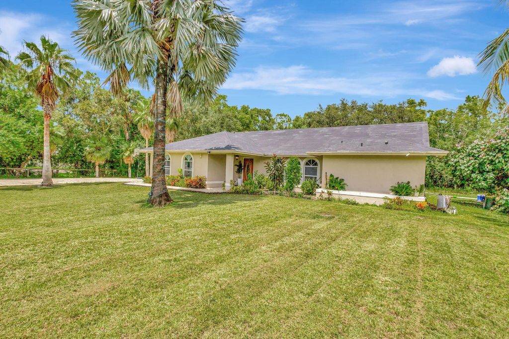 Photo of 12629 75th Lane N, The Acreage, FL 33412 (MLS # R11018615)