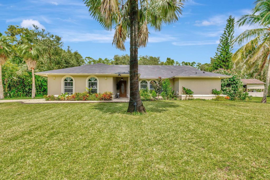 Photo of 12629 75th Lane N, The Acreage, FL 33412 (MLS # R11018615)