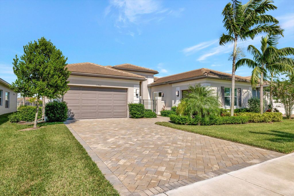 Photo of 11940 SW Sailfish Isles Way, Port Saint Lucie, FL 34987 (MLS # R10931756)