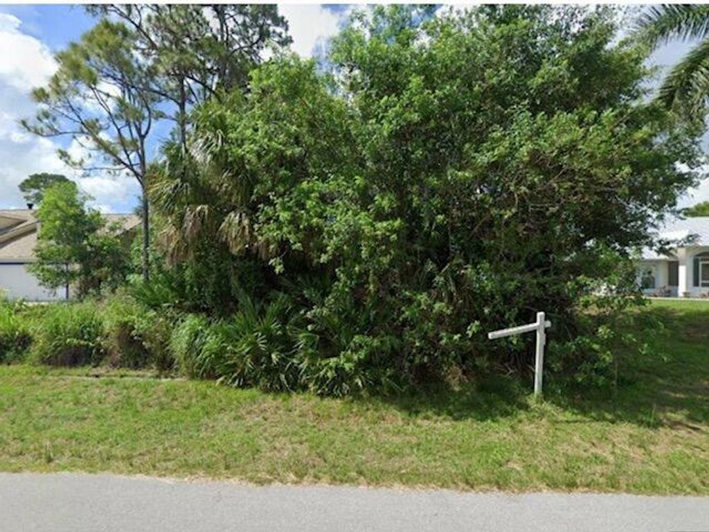 Photo of 1049 SW Majorca Avenue, Port Saint Lucie, FL 34953 (MLS # B26023654)