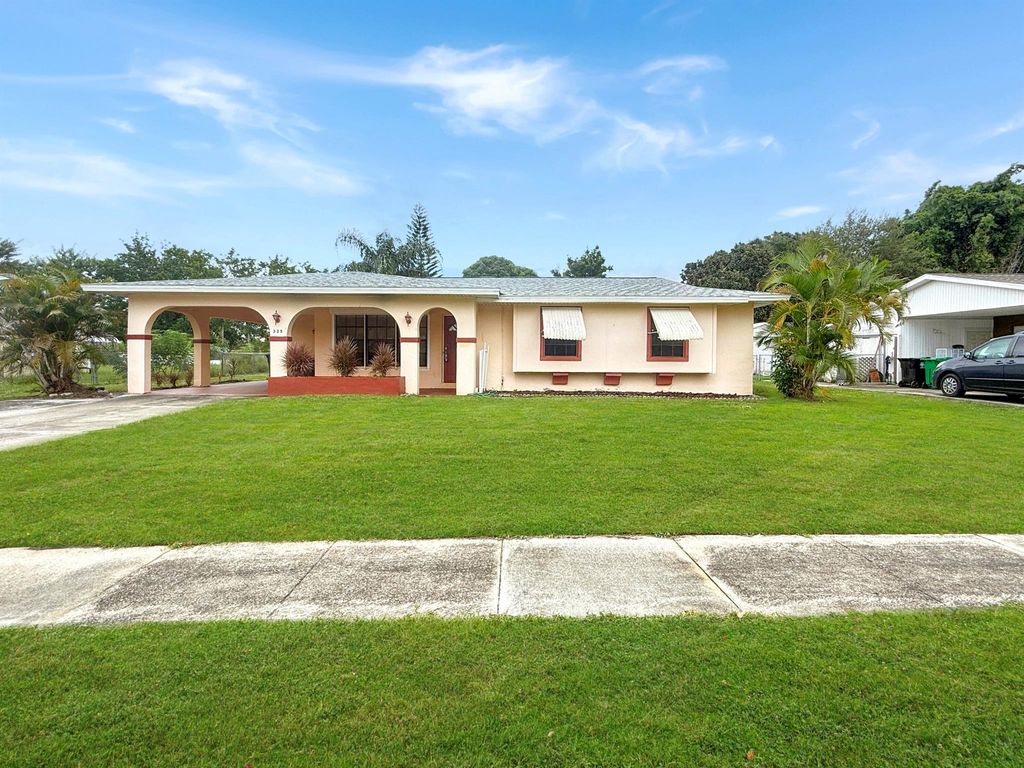 Photo of 325 NE Orchard Street, Port Saint Lucie, FL 34983 (MLS # R11124036)