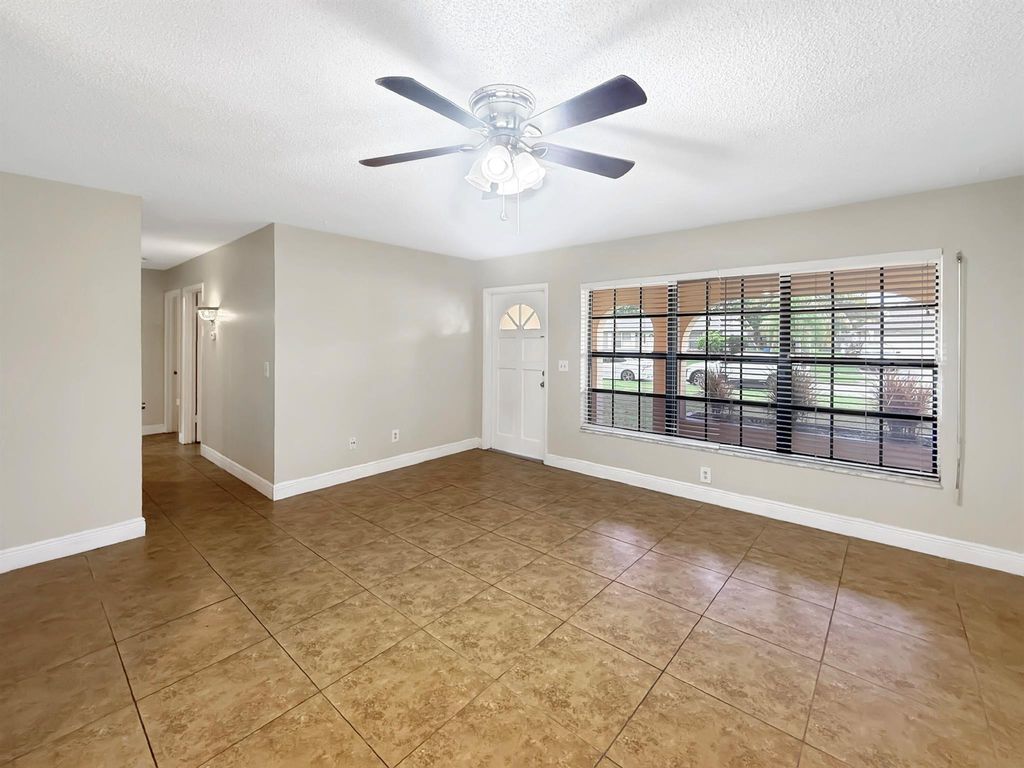 Photo of 325 NE Orchard Street, Port Saint Lucie, FL 34983 (MLS # R11124036)