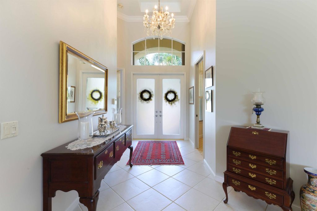 Photo of 401 Via Placita, Palm Beach Gardens, FL 33418 (MLS # R10902652)