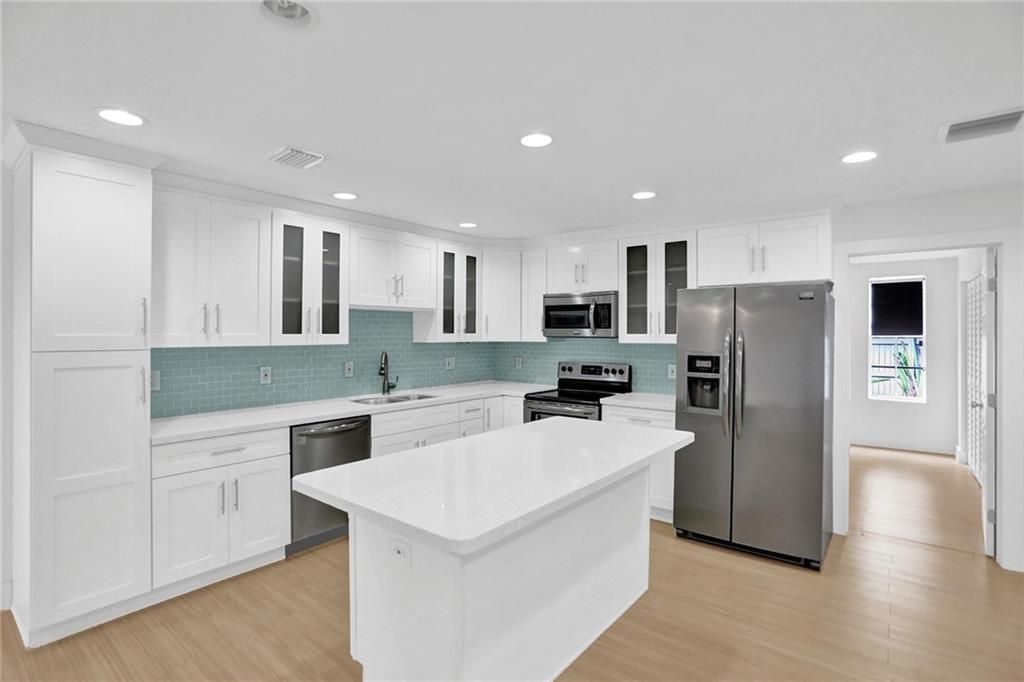 Photo of 5211 NW 76th Pl, Pompano Beach, FL 33073 (MLS # F10302237)