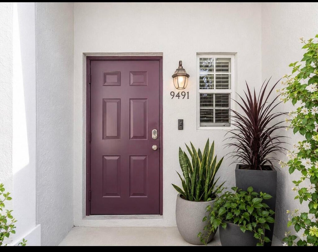 Photo of 9491 Stanley Lane, Tamarac, FL 33321 (MLS # B26078168)