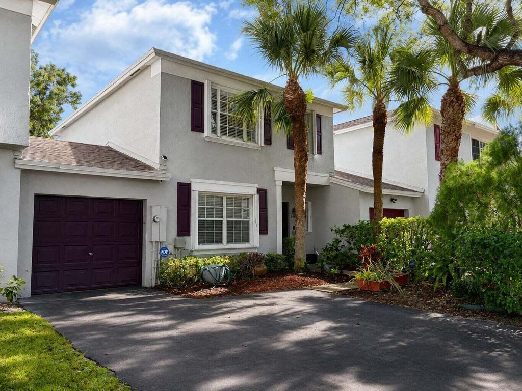 Photo of 9491 Stanley Lane, Tamarac, FL 33321 (MLS # B26078168)