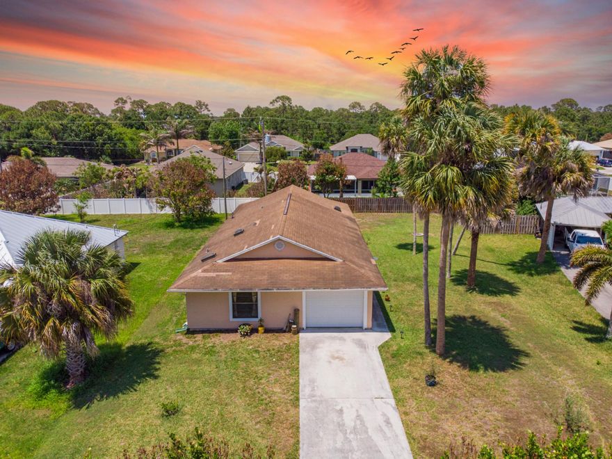 Welcome home to this spacious and well maintained 3 bedroom, 2 bathroom home with a 1 car garage offering 1524 sqft of comfortable living space in a convenient Port Saint Lucie location near Tradition. This home features a spacious layout with oversized bedrooms and abundant natural light throughout. Recent updates include new interior paint, new bathroom vanities, newer stainless steel appliances, oversized laundry room with brand new washer & dryer, hot water heater only 3 years old, and new French doors leading to the covered patio. Conveniently located close to I95, the Turnpike, shopping, dining, schools, hospitals, and just a short drive to Treasure Coast beaches. Great opportunity for first time homebuyers, seasonal residents, those looking to downsize, or investors.